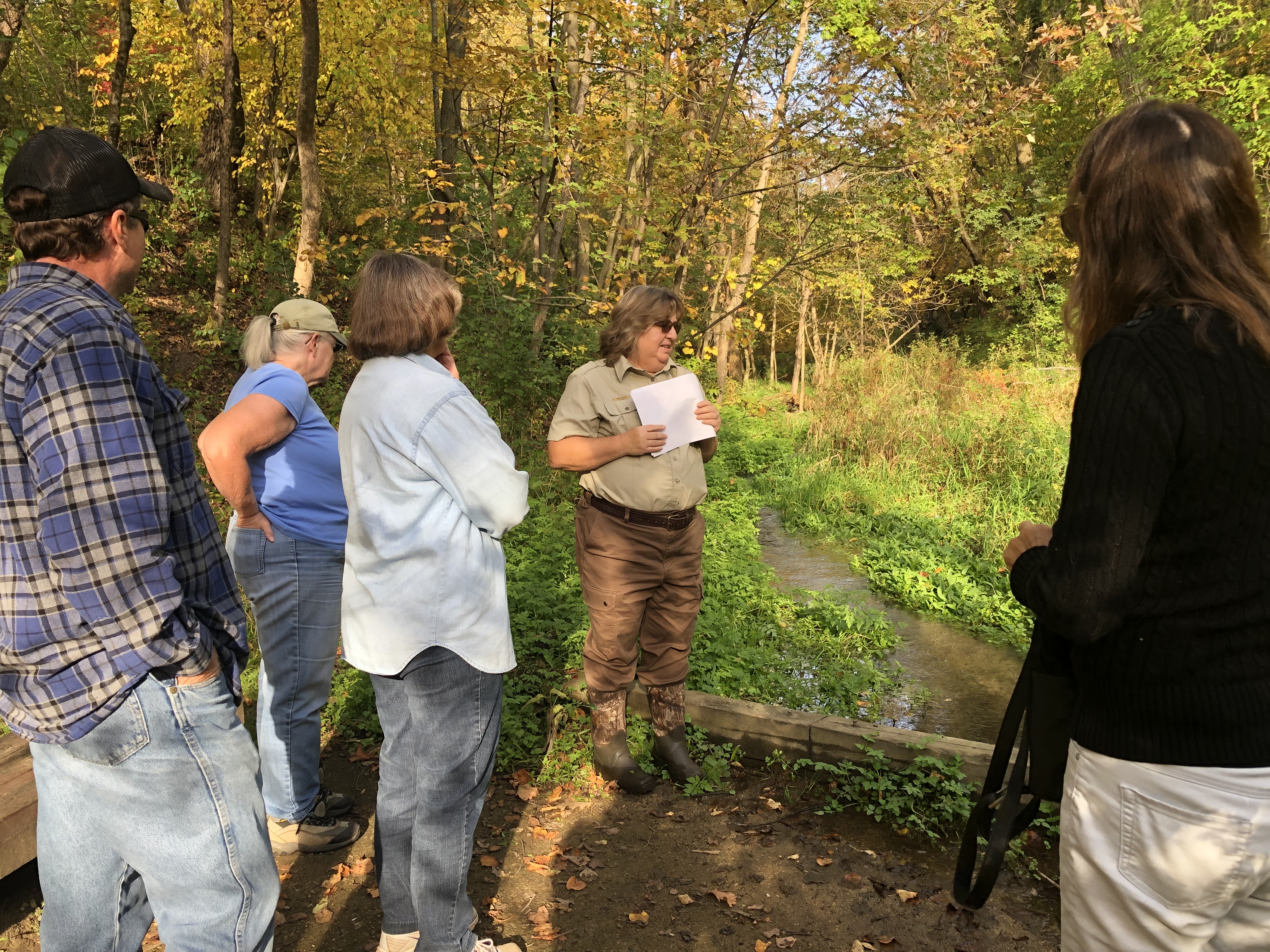 A group tours Ike's Creek