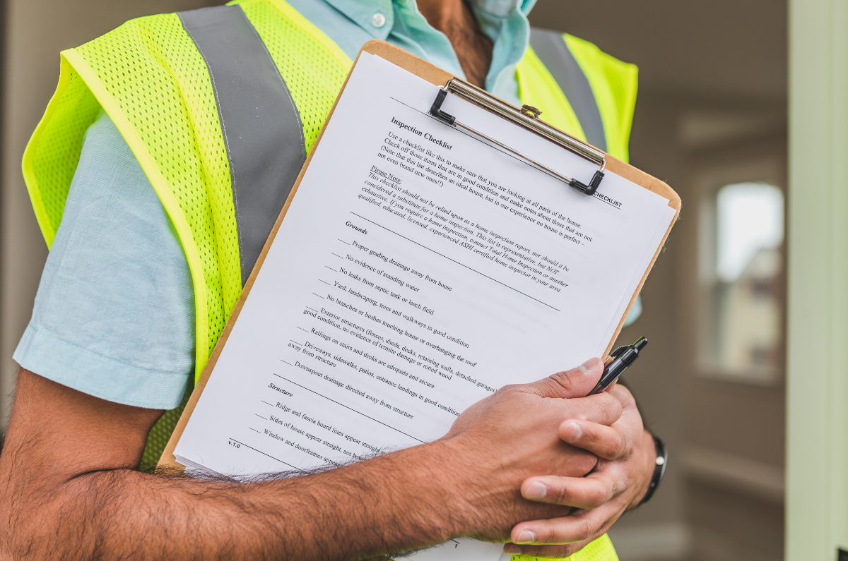 An inspector holding a clipboard